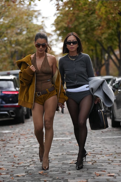 Camila Coelho and Aimee Song are seen, outside Miu Miu, during the Womenswear Spring/Summer 2024 sho...