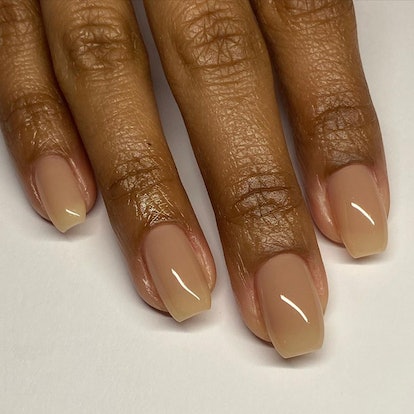 One of the most popular winter nail polish color trends for 2024 is sheer nude.