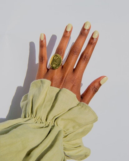 One of the most popular winter nail polish color trends for 2024 is light green.