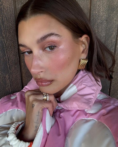 Hailey Bieber's pink holiday makeup look.