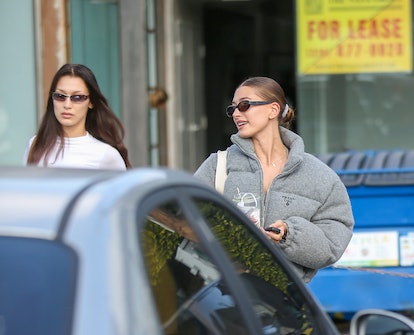 Hailey Bieber and Bella Hadid are fans of the slicked-back bun hairstyle, a look that's become synon...