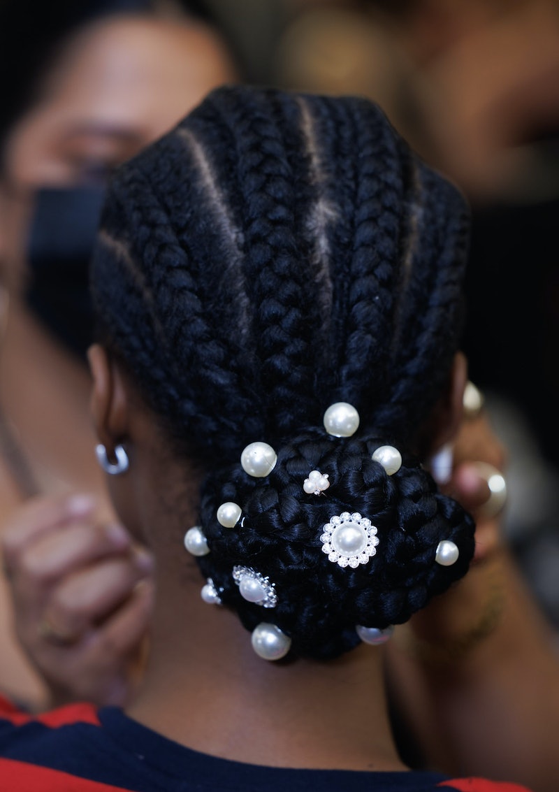 Pearl hair accessories on a model's braids at Alice + Olivia's NYFW Spring/Summer 2024 show,