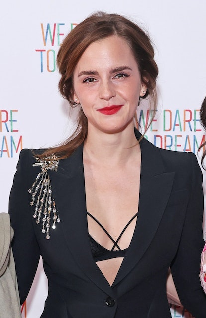 Emma Watson wore a criss-cross bralette under her Alexander McQueen blazer